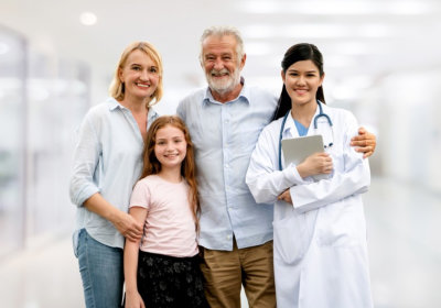 doctor with her patients smiling