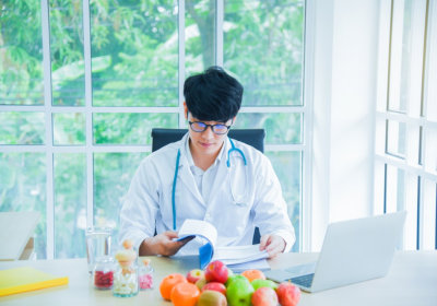 doctor reviewing records