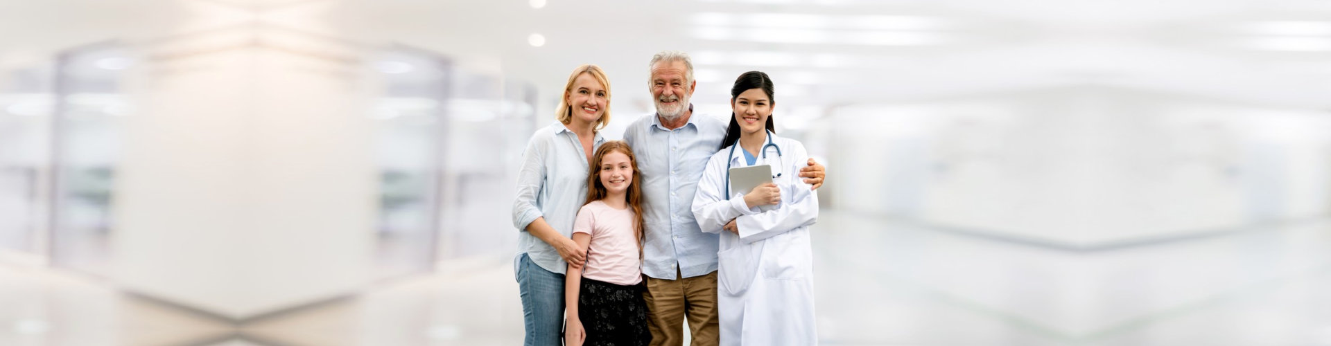 doctor with her patients smiling