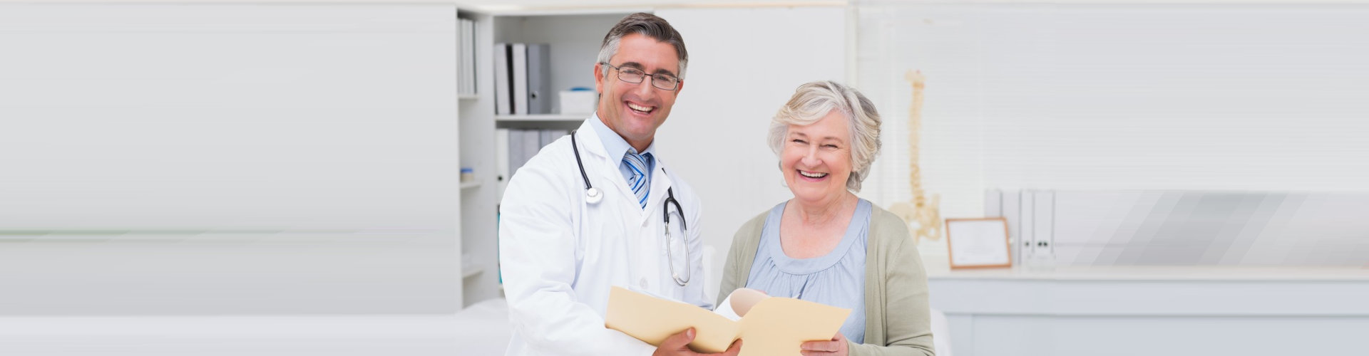 doctor along with his patient smiling