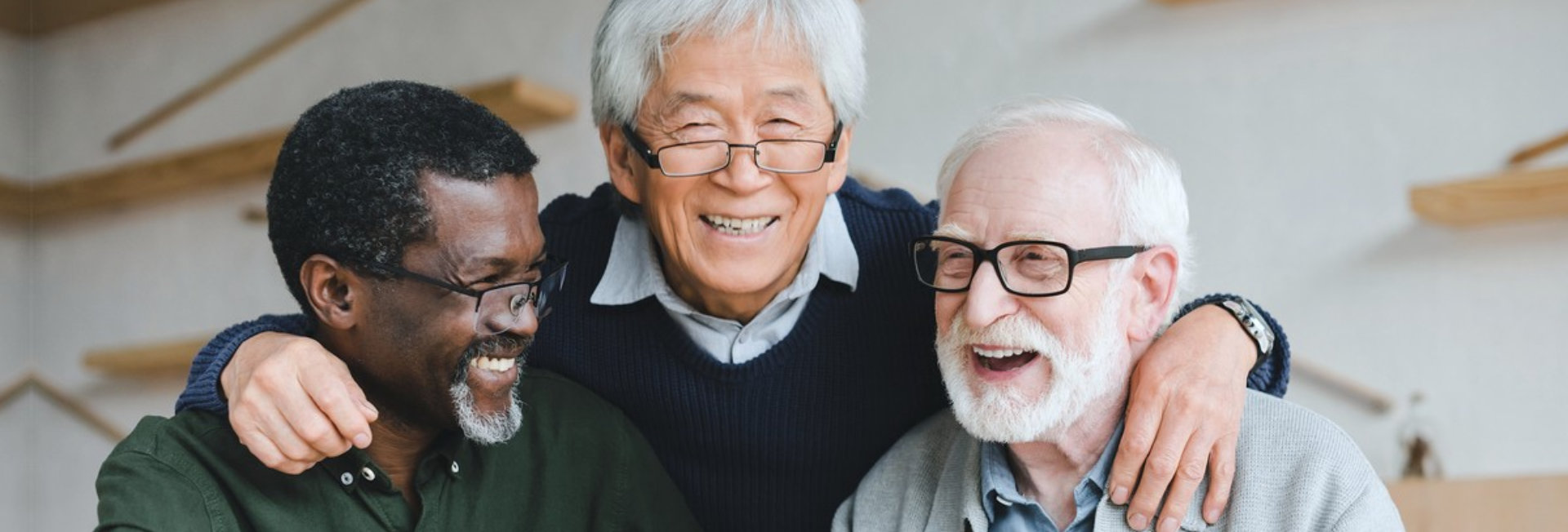 group of male senior man wearing eyeglasses smiling