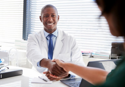 doctor shaking hands with his patient